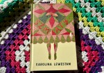 Szmaty, the book on a granny-square blanket